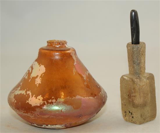 An Islamic glass unguent container, c.600 AD and a Roman glass vessel, 2nd - 4th century AD, 7cm